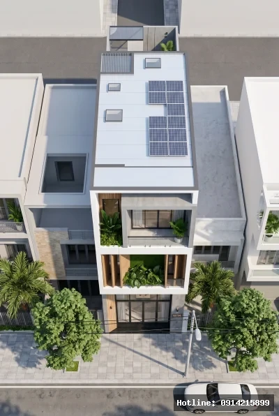 Góc nhìn từ trên xuống | Ngôi nhà có thiết kế hiện đại với việc sử dụng vật liệu kính và bê tông kết hợp cùng các chi tiết gỗ tạo cảm giác ấm áp và gần gũi với thiên nhiên. Các tấm pin năng lượng mặt trời trên mái cho thấy sự chú trọng đến yếu tố bền vững và tiết kiệm năng lượng. Ánh sáng tự nhiên tràn ngập qua các cửa sổ lớn, kết hợp với không gian xanh tạo ra cảm giác thoáng đãng và thư giãn.