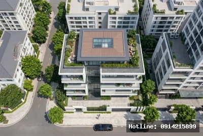 Góc nhìn từ trên xuống | Tòa nhà có kiến trúc hiện đại với việc sử dụng vật liệu kính và bê tông, tạo cảm giác mở rộng và thoáng đãng. Mái có các mảng kính lớn để tối ưu hóa ánh sáng tự nhiên, kết hợp cùng cây xanh trên các tầng cao tạo không gian gần gũi với thiên nhiên. Các đường nét vuông vắn và sắc sảo đem đến cảm giác tinh tế và sang trọng cho tổng thể kiến trúc.