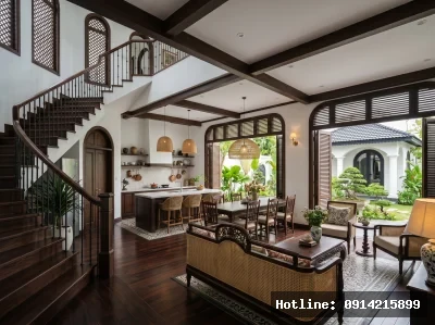 Không gian sinh hoạt mở | Khu sinh hoạt chung kết nối phòng khách, bếp và bàn ăn trong một bố cục liền mạch. Vật liệu gỗ tối màu kết hợp ánh sáng tự nhiên mang lại cảm giác ấm cúng.